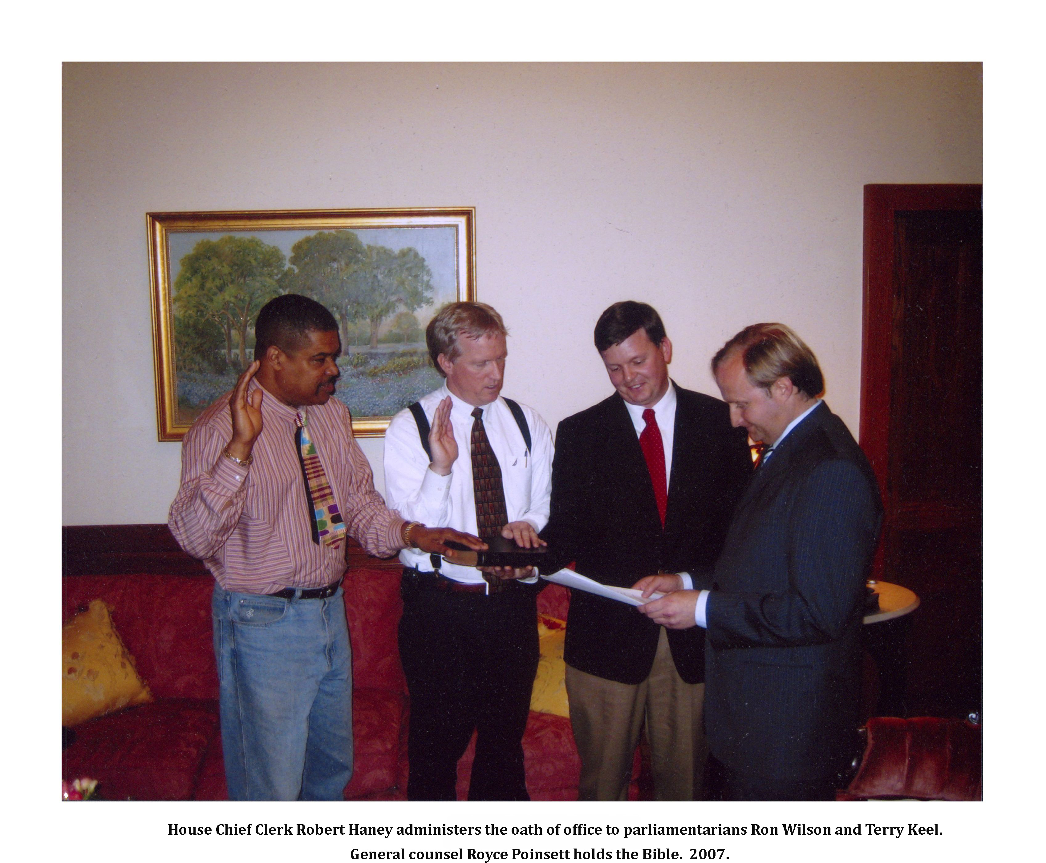 House chief clerk Robert Haney administers the oath of office to parliamentarians Ron Wilson and Terry Keel. General counsel Royce Poinsett holds the Bible. 2007. Photo courtesy of Terry Keel