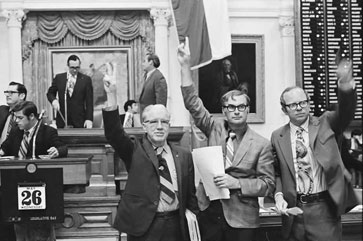 Members of the Texas Legislature demonstrating the act of 'keying.'
